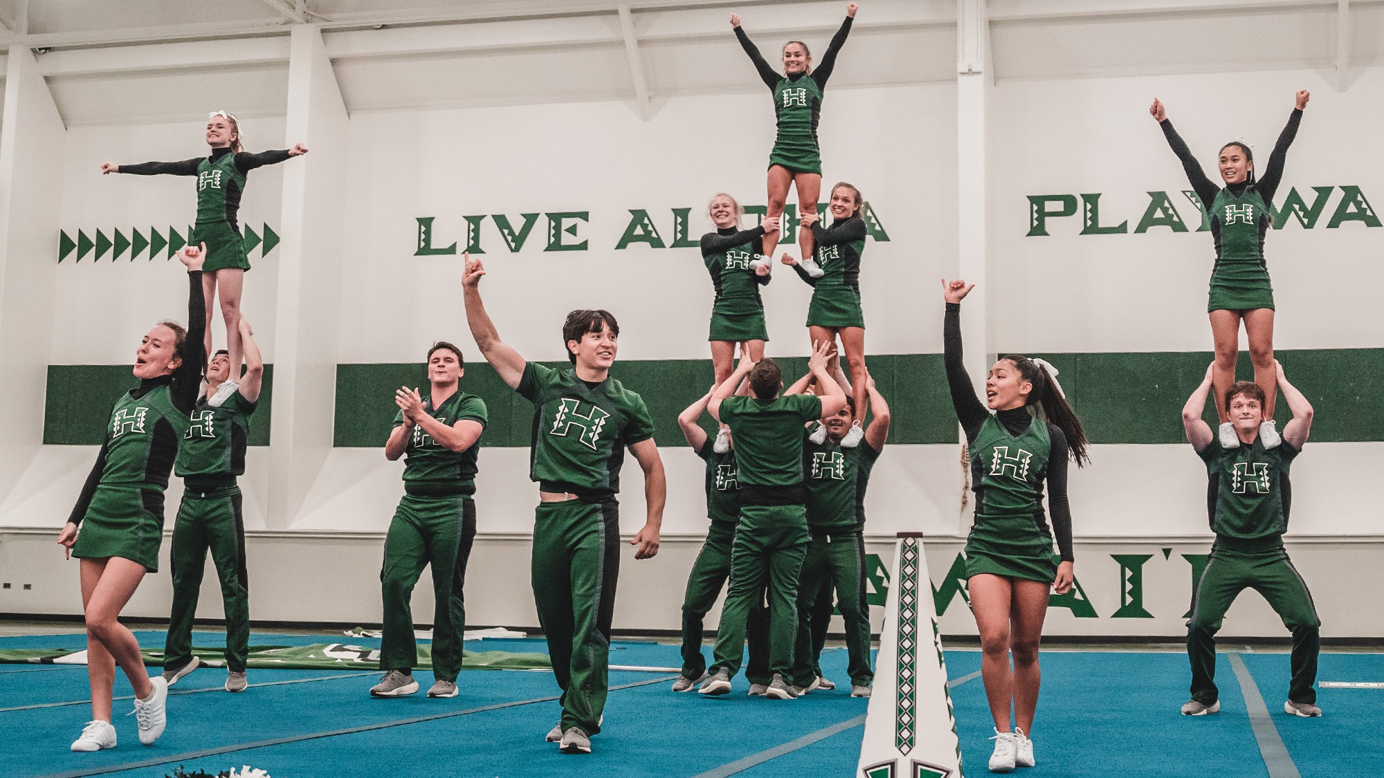 Hawaii All-Stars cheerleading team winning gold at world championship representing the pursuit of excellence and high performance in Hawaii